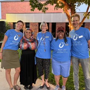 The campus ministry team at the block party outside Foss. 